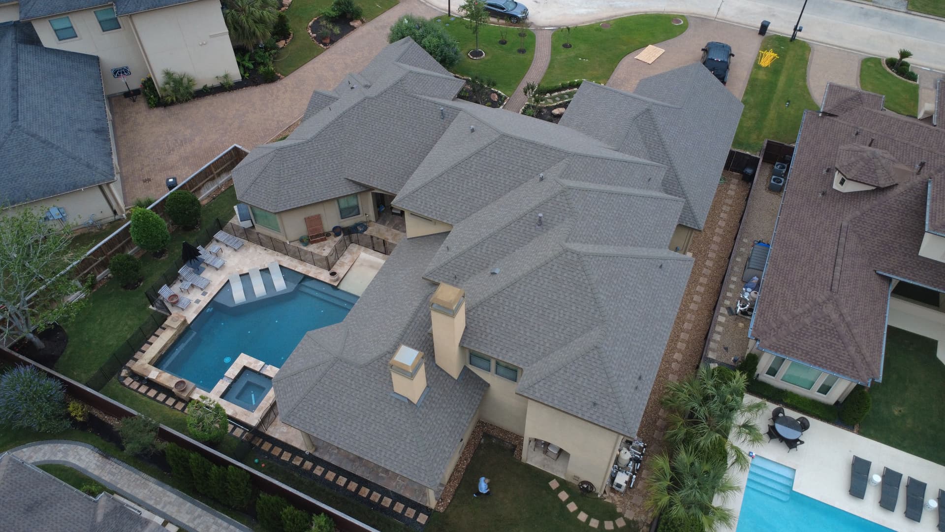 Gallery photos for 12,000 Sq. Ft. Insurance Roof Replacement with Seamless Gutters Up Next: Image #3