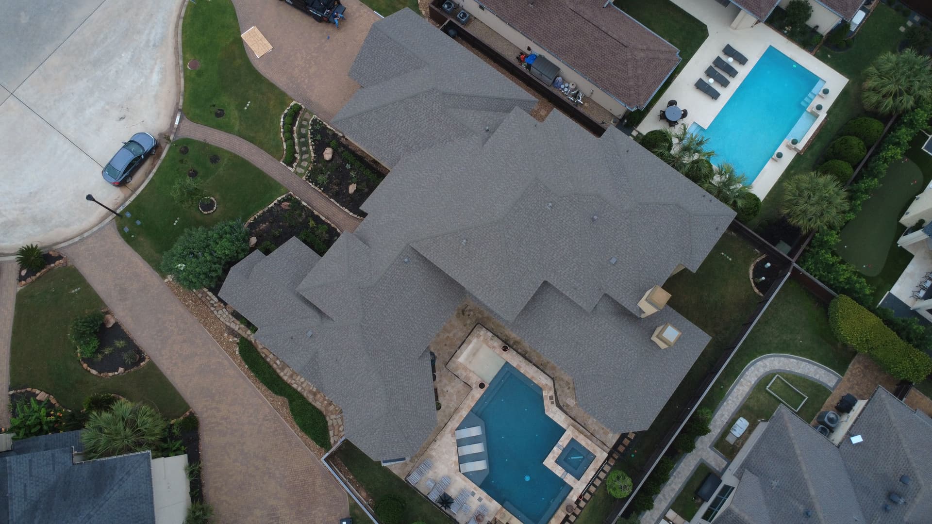 Gallery photos for 12,000 Sq. Ft. Insurance Roof Replacement with Seamless Gutters Up Next: Image #2